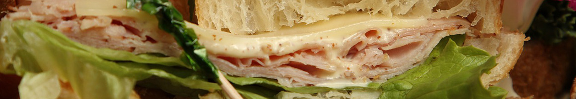 Eating Sandwich at Zero's Subs Oceanfront restaurant in Virginia Beach, VA.